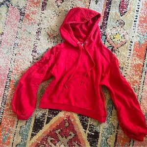 A new day cropped red sweatshirt with ballon sleeves size L